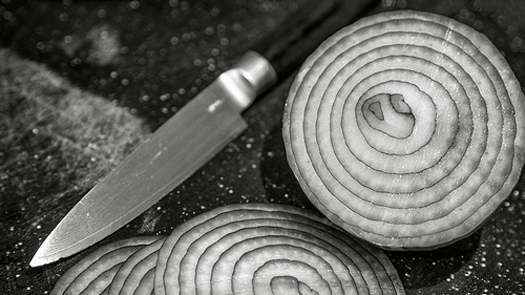 product image of kitchen knife and onions by T. Perkins Photography